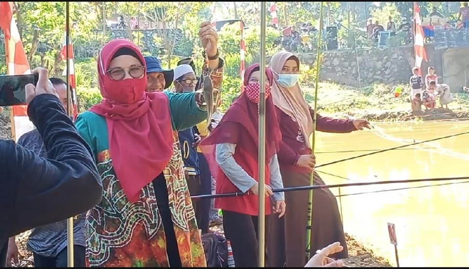 MENINGKATKAN IMUN TUBUH DENGAN MEMANCING IKAN.